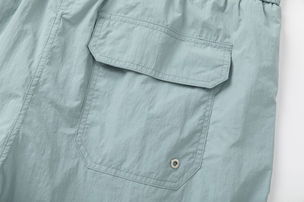 AMIRI Starburst logo shell swim shorts