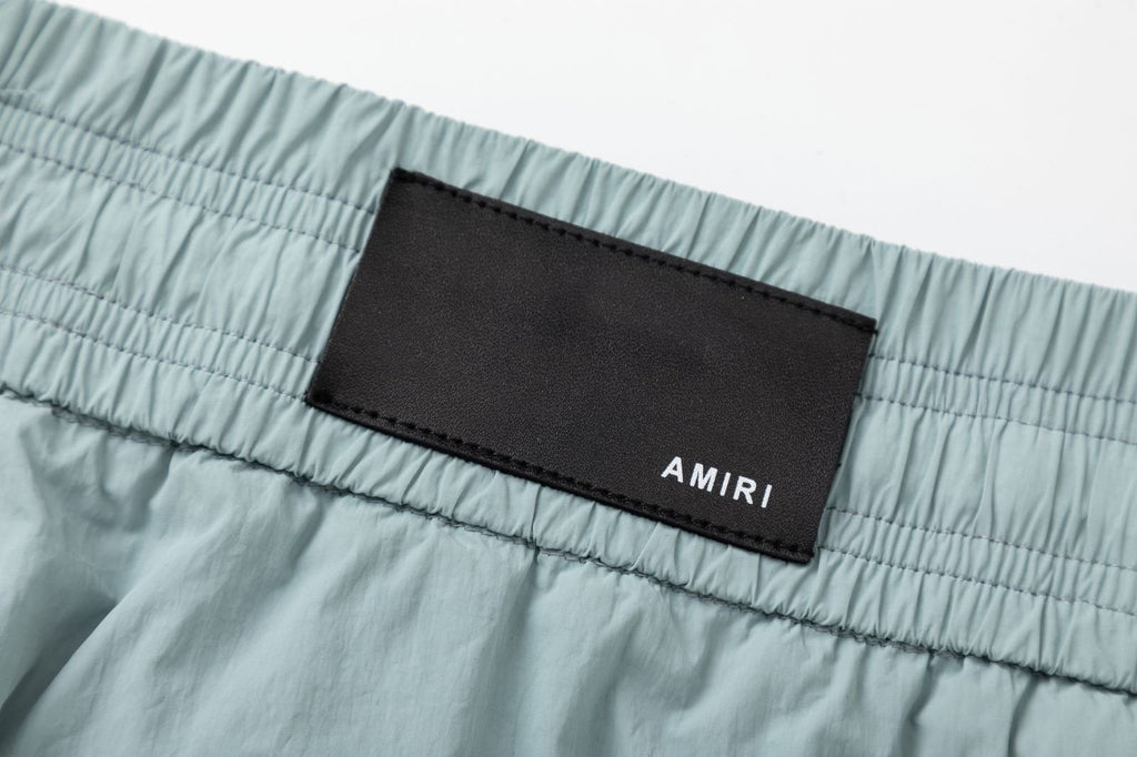 AMIRI Starburst logo shell swim shorts
